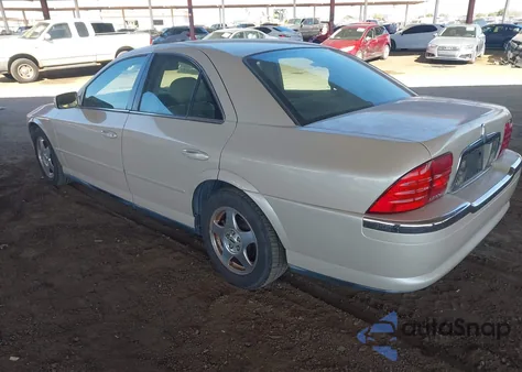 2000 Lincoln Ls V8 Auto z USA, uszkodzony, nr VIN 1LNHM87A7YY753280